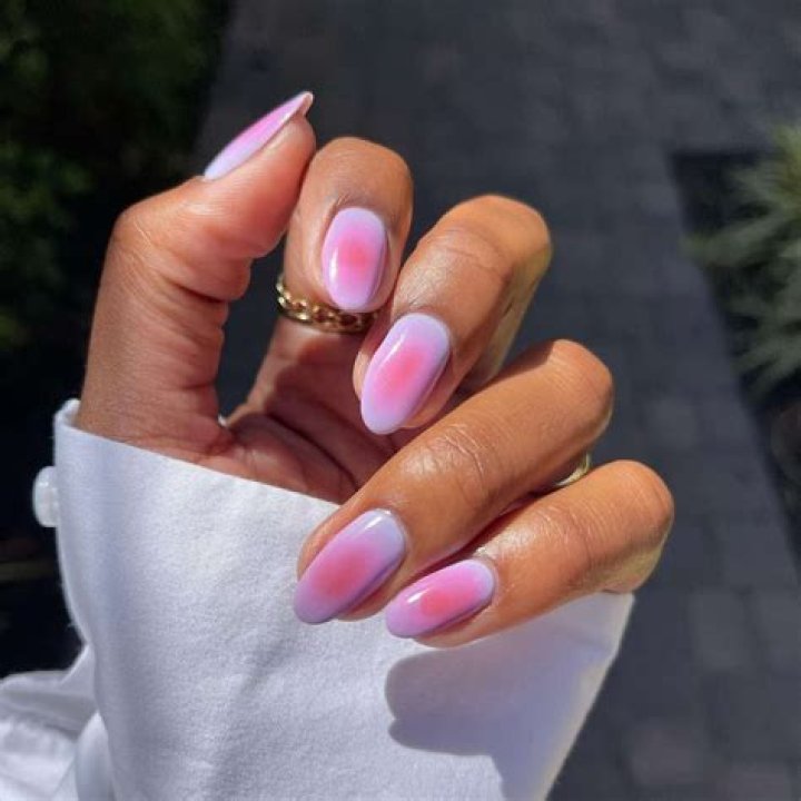 Aura nails with soft diffused color cloud gradient effect in pink and purple