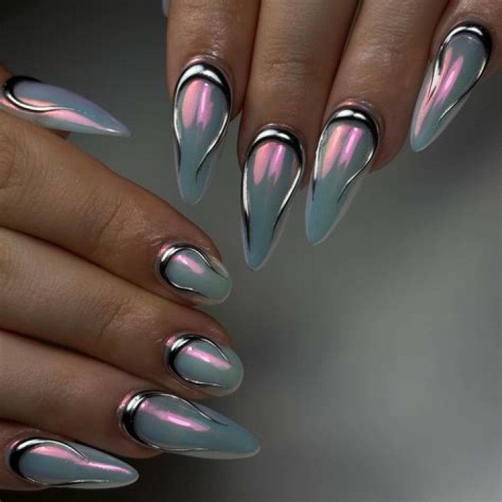 Futuristic metallic mirror and foil nail art designs for 2026