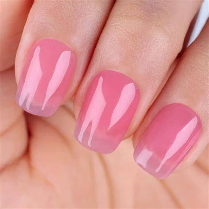 Glass translucent sheer nail art with iridescent film effect 2026
