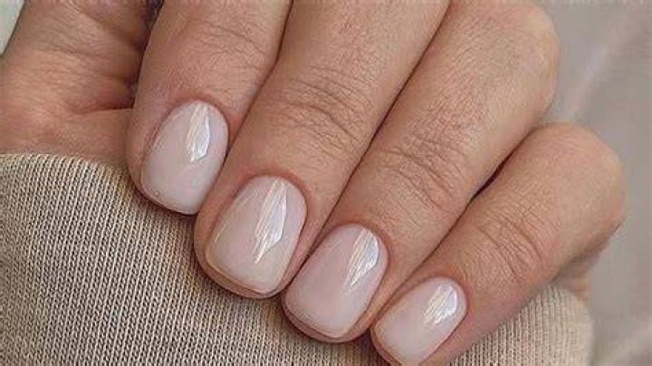 Quiet luxury minimalist nails in neutral beige and cream tones